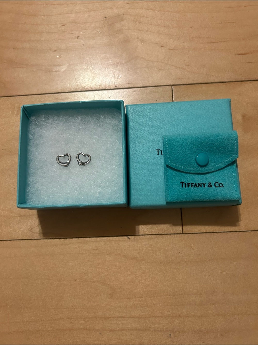 Tiffany & Co. Elsa Peretti Open Heart Silver Stud Earrings.